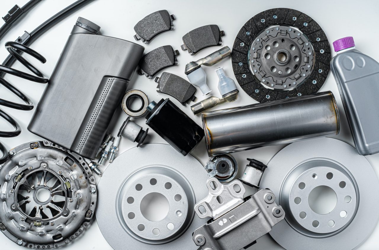 Start 16 new metal auto parts on grey background